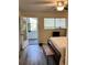 Comfortable bedroom with an outside view and sliding glass door access to a balcony at 8080 112Th St # 206, Seminole, FL 33772