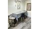 Dining area featuring decor, wood-look flooring and a modern aesthetic at 8080 112Th St # 206, Seminole, FL 33772