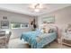 Comfortable bedroom featuring twin bed, wicker accents, and natural lighting at 845 Jolanda Cir, Venice, FL 34285