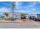 Single-story home with a covered carport and a driveway at 845 Jolanda Cir, Venice, FL 34285