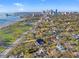 Aerial view of the property, showcasing a waterfront view and nearby city skyline at 864 15Th Ne Ave, St Petersburg, FL 33704