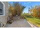 Wooden back deck surrounded by lush greenery and plants at 864 15Th Ne Ave, St Petersburg, FL 33704