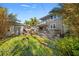 View of the backyard with a small deck on the back of the house at 864 15Th Ne Ave, St Petersburg, FL 33704