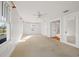 Bright bedroom with large windows, neutral carpet, and a ceiling fan at 864 15Th Ne Ave, St Petersburg, FL 33704