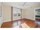 Hardwood floors and natural light fill this room at 864 15Th Ne Ave, St Petersburg, FL 33704
