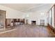 Spacious living room with fireplace, natural light, and hardwood floors, ready for renovation at 864 15Th Ne Ave, St Petersburg, FL 33704