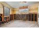 Unfinished room with window and exposed wall in need of renovation at 864 15Th Ne Ave, St Petersburg, FL 33704