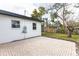 Exterior of home with a brick patio area at 1316 Barry St, Clearwater, FL 33756