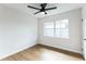 Bedroom with hardwood floors, natural light, and a ceiling fan at 1316 Barry St, Clearwater, FL 33756