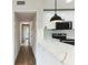 Bright kitchen showcases modern appliances, stone countertops, and a stylish pendant light at 1316 Barry St, Clearwater, FL 33756