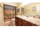 Bathroom with a shower/tub combo, a vessel sink, and a coastal theme at 1375 Corner Oaks Dr, Brandon, FL 33510