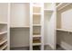A walk-in closet that features built-in shelving and storage at 1375 Corner Oaks Dr, Brandon, FL 33510