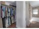 Walk-in closet and bathroom with tile floors, shower, and tub at 1415 54Th N Ave, St Petersburg, FL 33703