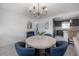 Open floor plan with dining area and kitchen with stainless appliances at 1415 54Th N Ave, St Petersburg, FL 33703