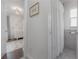 Hallway view of the Bedroom and bathroom with shower behind the curtain at 1415 54Th N Ave, St Petersburg, FL 33703