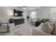 Bright living space with comfortable seating, modern furniture, and lots of light at 1415 54Th N Ave, St Petersburg, FL 33703