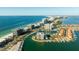 Breathtaking aerial view of waterfront condos, offering stunning ocean views and boat docks at 1651 Sand Key Estates Ct # 53, Clearwater, FL 33767