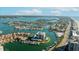 Scenic aerial shot of waterfront properties with private docks and beautiful coastal scenery at 1651 Sand Key Estates Ct # 53, Clearwater, FL 33767