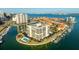 Stunning aerial view showcasing the condo's prime waterfront location and amenities at 1651 Sand Key Estates Ct # 53, Clearwater, FL 33767