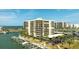 Exterior view of the condo building located on the water at 1651 Sand Key Estates Ct # 53, Clearwater, FL 33767