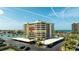 Exterior view of the condo building with waterfront views at 1651 Sand Key Estates Ct # 53, Clearwater, FL 33767