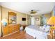 Comfortable main bedroom with stylish furnishings, a ceiling fan, and ample natural light at 1651 Sand Key Estates Ct # 53, Clearwater, FL 33767
