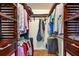Spacious walk-in closet with built-in shelving and ample storage space at 1651 Sand Key Estates Ct # 53, Clearwater, FL 33767
