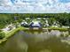 Aerial view of lakeside clubhouse, a great amenity for the entire Gathering at 17802 Everlong Dr, Land O Lakes, FL 34638