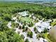 Aerial view of pool, clubhouse and green space in this amenity-rich community at 17802 Everlong Dr, Land O Lakes, FL 34638