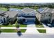 Charming two-story home with landscaped front yard and inviting entrance, showcasing curb appeal at 17802 Everlong Dr, Land O Lakes, FL 34638