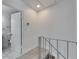 Second floor hall with wood floors and bathroom access at 1828 Bough Ave # 3, Clearwater, FL 33760