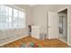 Neutral bedroom features a bright window, closet, and a dresser at 23137 Emerson Way, Land O Lakes, FL 34639