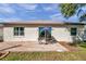 Comfortable back patio with room to entertain and a sliding glass door that allows natural light to enter the home at 3111 Park N St, St Petersburg, FL 33710