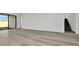 Bright living area featuring modern flooring and seamless access to the upper level at 32347 Wetland Bird Vw, San Antonio, FL 33576