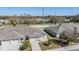 Aerial view of a well-maintained single Gathering home with a manicured lawn and adjacent building at 37850 Prairie Rose Loop, Zephyrhills, FL 33542