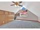 Spacious bonus room with unique architecture, featuring natural light and ample storage at 4711 Travertine Dr, Tampa, FL 33615