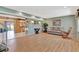 Spacious living room featuring light wood flooring and plenty of natural light at 4711 Travertine Dr, Tampa, FL 33615