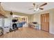 Bright living room offering hardwood floors and open access to other rooms at 4711 Travertine Dr, Tampa, FL 33615