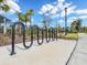 Convenient bicycle rack provides secure parking near community amenities and is close to neighborhood sidewalk at 5027 Autumn Ridge Dr, Wesley Chapel, FL 33545
