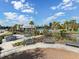 Enjoy outdoor seating, picnic tables and barbecue grills near the community pool and building in this neighborhood at 5027 Autumn Ridge Dr, Wesley Chapel, FL 33545