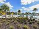 Relax and soak up the sun by the community pool, with plenty of seating and lush landscaping at 5027 Autumn Ridge Dr, Wesley Chapel, FL 33545