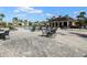 Relaxing community pool surrounded by lounge chairs, perfect for recreation and relaxation at 5027 Autumn Ridge Dr, Wesley Chapel, FL 33545