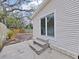 Backyard patio area with a sliding glass door entrance to the kitchen at 5630 55Th N St, St Petersburg, FL 33709