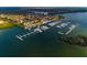 Beautiful aerial view of a coastal community with marina, docks, and waterfront homes at 6030 Printery St # 107, Tampa, FL 33616