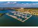 Aerial view of a marina with many boats docked along the pier in a body of water at 6030 Printery St # 107, Tampa, FL 33616