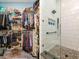 Spacious walk-in closet with custom shelving and ample storage for clothes and accessories at 6030 Printery St # 107, Tampa, FL 33616