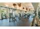 Bright fitness center with state-of-the-art equipment, large mirrors, and various weight training machines at 6030 Printery St # 107, Tampa, FL 33616