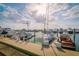 This marina features several boats docked on the water during a sunny day at 6030 Printery St # 107, Tampa, FL 33616