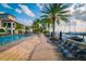 Community waterfront pool next to the marina with lounge chairs at 6030 Printery St # 107, Tampa, FL 33616