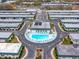 An aerial view of the community highlighting the pool area and the surrounding residential buildings at 7816 38Th N Ter # 7816, St Petersburg, FL 33709